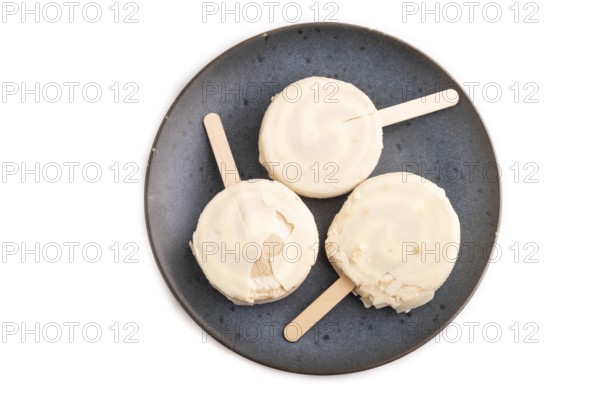 ?hocolate Ice cream in white glaze isolated on white background, top view, flat lay, close up,