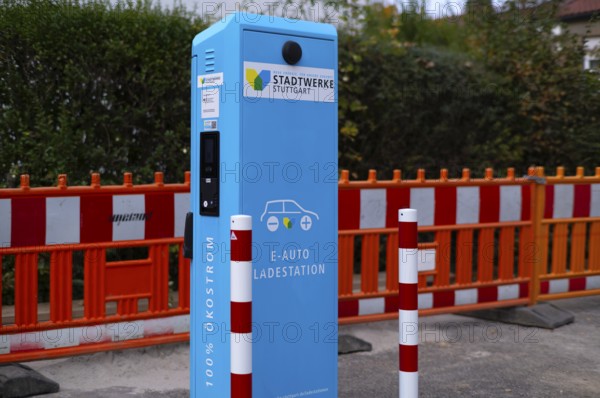 Parking lot with gas pump, EnBW charging station for electric cars, charging station, e-mobility,