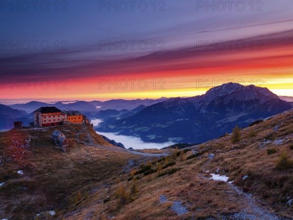 Watzmannhaus at dawn, fog in the valley, right Hoher Göll, Berchtesgaden National Park, Schönau am