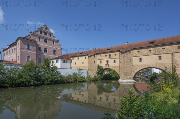 On the left, the Electoral Palace, with so-called city glasses, late medieval water gate building
