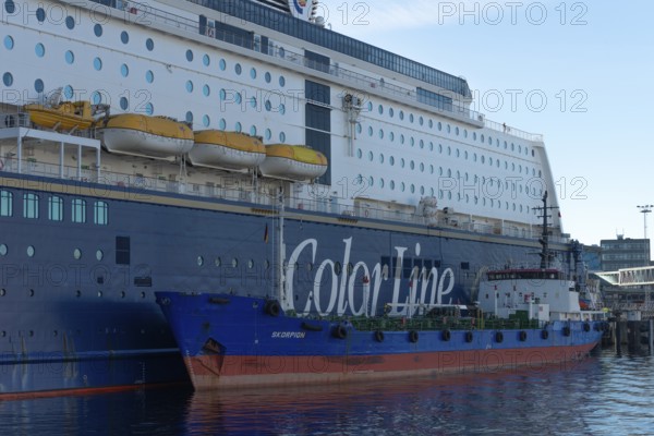 Kiel port, Kiel-Oslo ferry line, Color Line ferry and crusader being refueled, tanker for oil