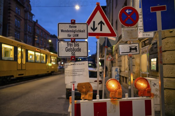 Sign forest, several traffic signs, construction site, stopping ban, dead end, oncoming traffic,