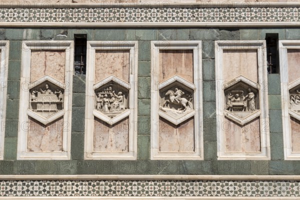 Detailed view of the reliefs on the Campanile di Giotto, the bell tower of the Cathedral of Santa