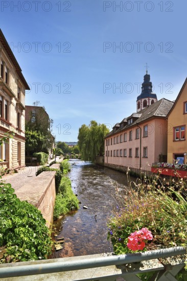 Ettlingen, Germany - August 13th 2025: View from bridge on Alb river in historic city center with