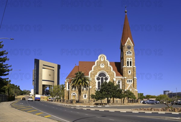 Evangelical Lutheran Christ Church from 1910, in the background the Independence Museum, Windhoek,