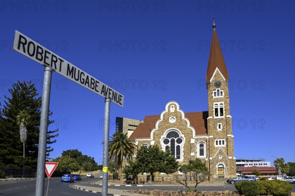 Robert Mugabe Avenue sign in front of the 1910 Evangelical Lutheran Christ Church, Windhoek, Khomas