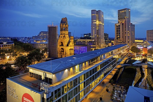 Bikini Berlin with Kaiser Wilhelm Memorial Church from an elevated position in the evening,