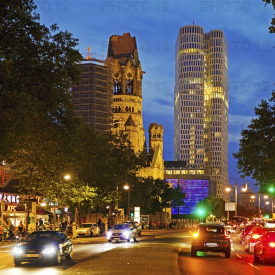 Budapester Straße with Kaiser Wilhelm Memorial Church and Upper West Tower in the evening,