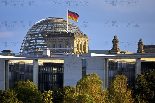 Reichstag dome with German flag, German Bundestag, government district, Berlin, Germany