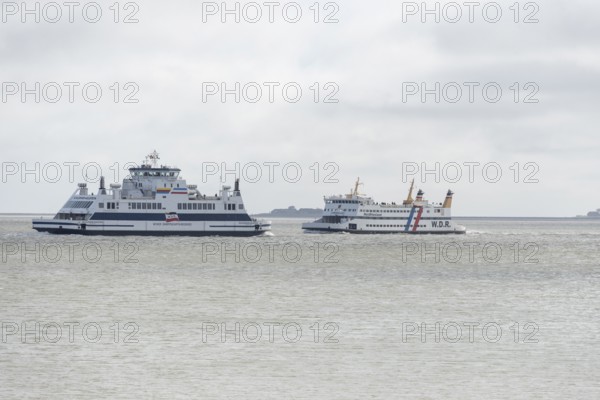 Two ferries of the Wyker Dampfschiffs-Reederei (W.D.R.), on the left car ferry Schleswig-Holstein,