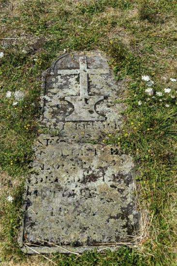Auvergne Volcanoes Regional Natural Park, old cemetery tombstone at Pic Saint Pierre Saint Pierre