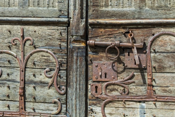 Ancient lock and mechanism of the Romanesque church of Mailhat in Puy de Dome, Auvergne Rhone