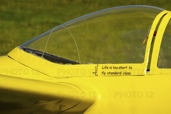 Life is too short to fly standard class, slogan on the canopy frame of a Letov LF-107 Lunak glider