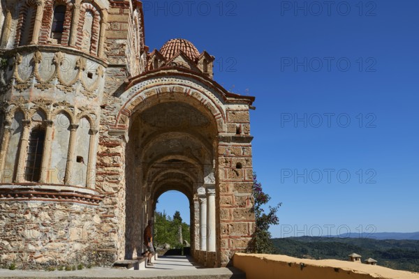 Pantanassa Monastery from the 15th century AD, An ancient archaic passageway in Greece against a