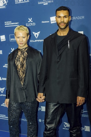 Eliob Demofike with partner Myat on the red carpet in front of the award ceremony at the Pullmann