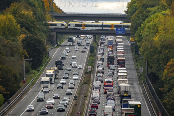 Local train crossing the A3 motorway between the Hilden junction and the Mettmann junction, view to