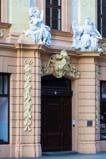 Entrance door with statues at the Romanus House, Brühl, Leipzig, Saxony, Germany
