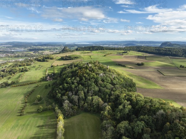 Aerial view of the Hegau volcano and the Mägdeberg castle ruins, on the horizon the Hohenkrähen and