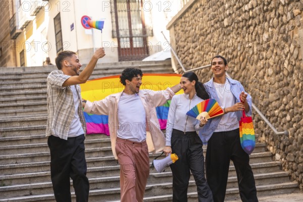 Diverse friendship group celebrating lgbtq plus pride and equality during a parade, walking down