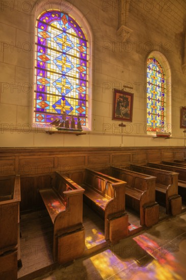 Colourful stained glass windows in the church of Saint Martin, Yport, Département Seine-Maritime,