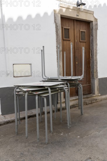 Restaurant furniture, for outdoor catering, tables, chairs, stacked, day off, catering closed, old