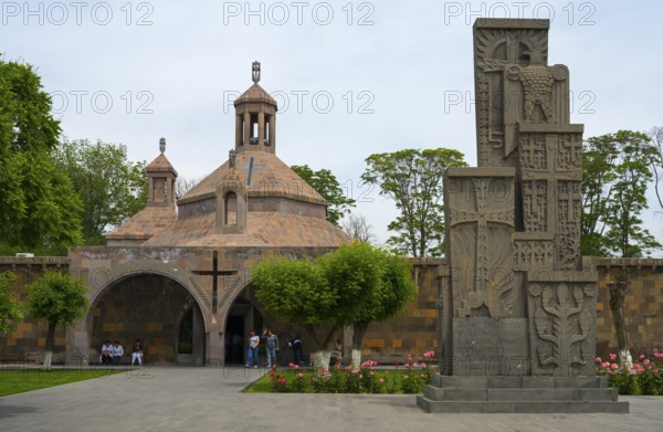 Historic church with characteristic architecture surrounded by manicured gardens and flowers, St