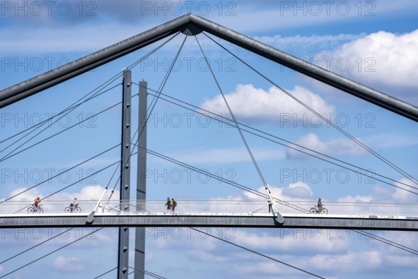 Bridges in Düsseldorf, in the foreground, the pedestrian and cycle bridge over the canal to the