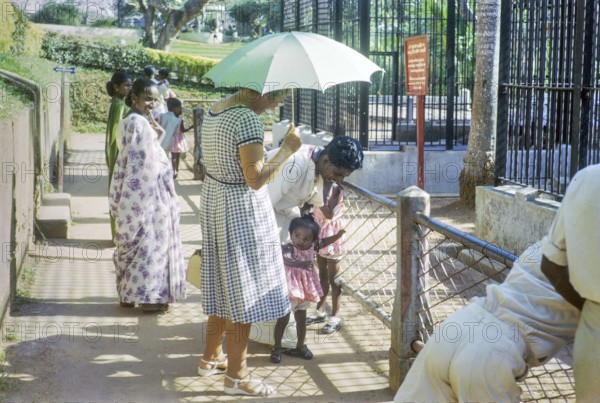 Baby shocked to see white Caucasian woman at zoo, Colombo, Sri Lanka, South Asia, Indian