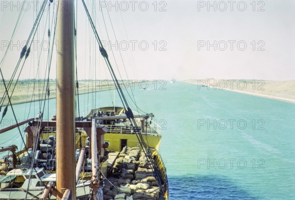Shipping passing through the Suez Canal photographed onboard a cargo ship, Egypt, norther Africa