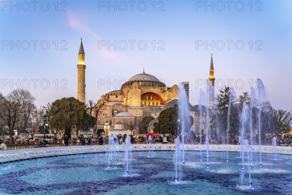 Fountain in Sultan Ahmet Park and the present-day mosque Hagia Sophia or Church of St Sophia at