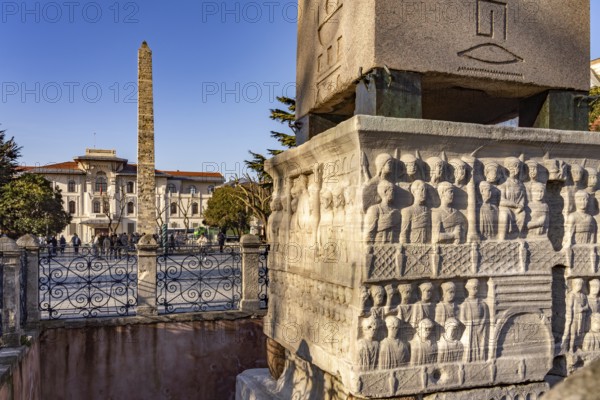 Marble base of the ancient Egyptian Obelisk of Theodosius or Obelisk of Istanbul with reliefs and