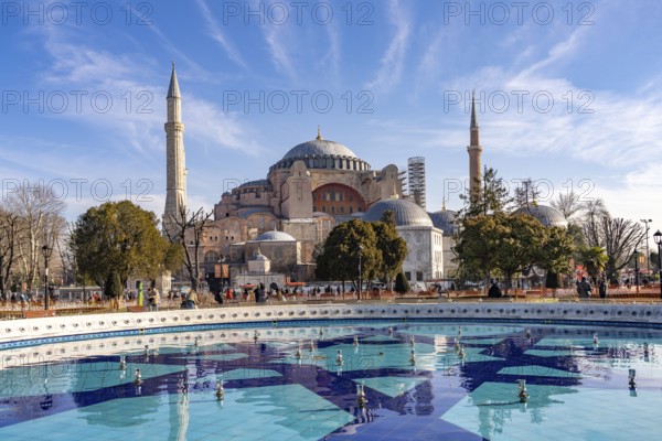 Fountain in Sultan Ahmet Park and the present-day mosque Hagia Sophia or Church of St Sophia,