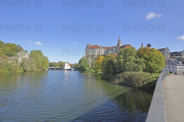 Hohenzollern Castle and Danube, bank with Panthelstein and autumn colours, landmark, castle bridge,