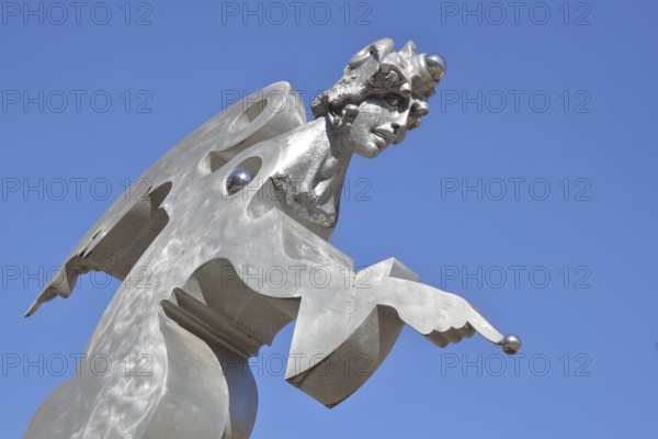 Sculpture guardian angel by Jürgen Goertz, modern art, water basin, fountain, bizarre shining angel