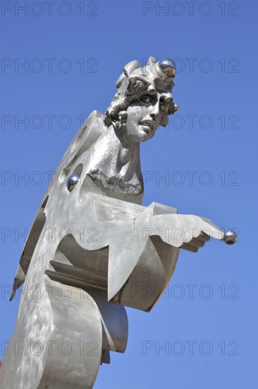 Sculpture guardian angel by Jürgen Goertz, modern art, water basin, fountain, bizarre shining angel