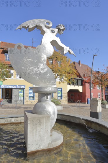Sculpture guardian angel by Jürgen Goertz, modern art, water basin, fountain, shiny angel with