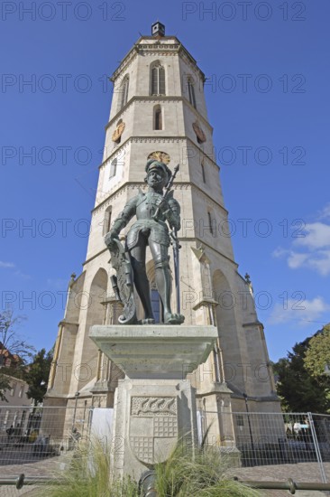 Market fountain with medieval knight figure, Württemberg coat of arms shield with sword, bronze