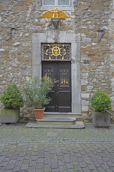 Front door with golden eagle figure to Kupferhof Schleicher, decoration, Burggasse, Rhineland,
