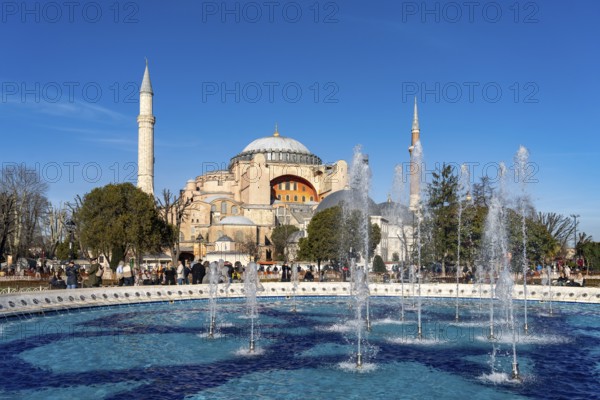 Fountain in Sultan Ahmet Park and the present-day mosque Hagia Sophia or Church of St Sophia,