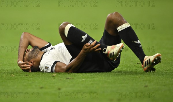 Jonathan Tah GER (04) injured on the ground Injury World Cup qualifier, international match,
