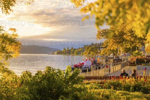 Picturesque lakeside promenade at sunset with a view over the tranquil lake, Überlingen, Lake