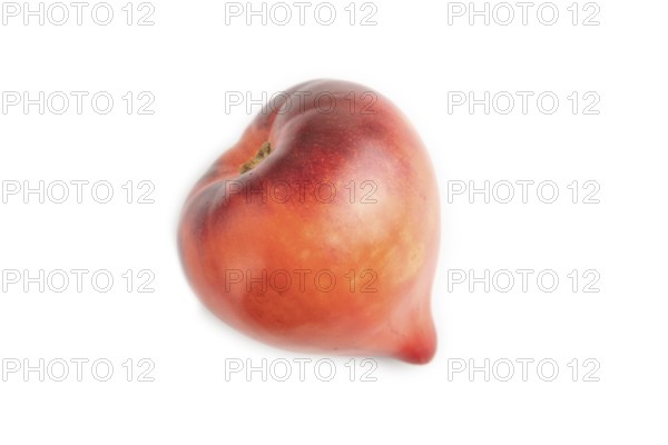 Red Heart shape tomatoes isolated on white background. Top view, copy space, flat lay, healthy