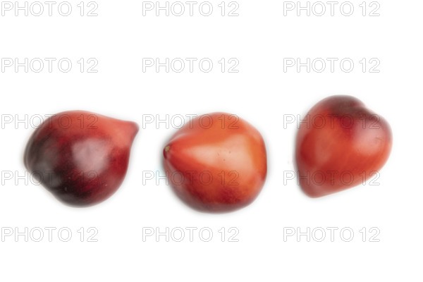 Red Heart shape tomatoes isolated on white background. Top view, copy space, flat lay, healthy
