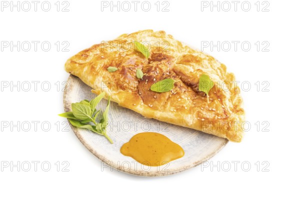 Fried homemade Khachapuri cake with cheese and meat, fried in pan. Traditional Georgian cuisine