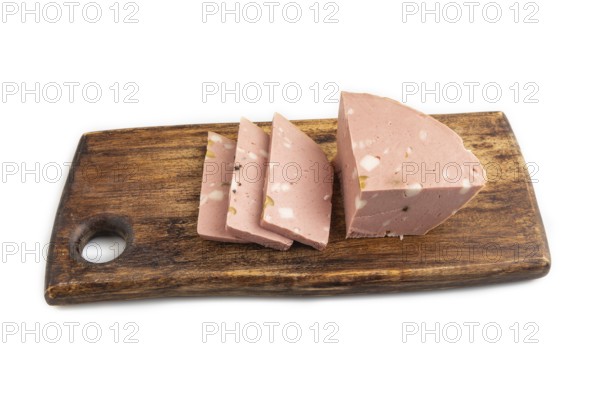 Mortadella sausage on wooden cutting board with pepper and herbs isolated on white background. Side