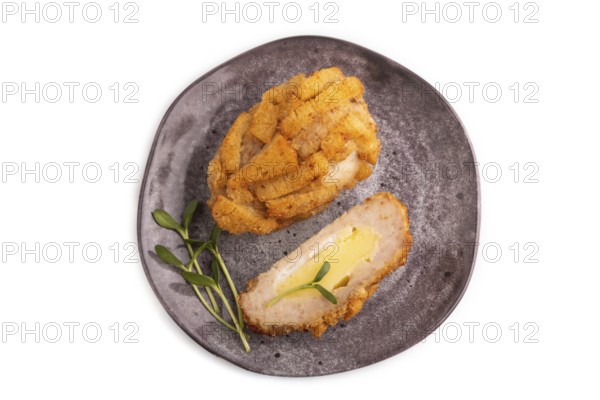 Chicken Schnitzel on gray plate with microgreen Isolated on white background. top view, flat lay,
