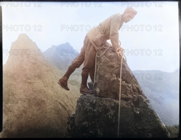 Colourised image of male rock climber thought to be Cuillin mountains, Skye, Scotland, UK c