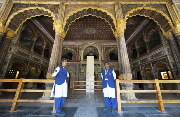 Indian woman guarding the Daria Daulat Bagh or Tipu Sultan's summer palace, Srirangapatna,