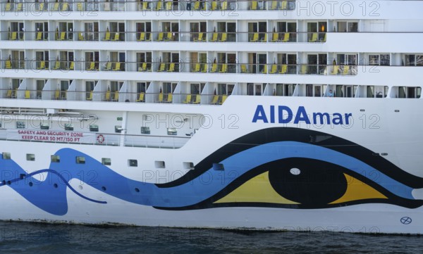 Close-up, cruise ship AIDAmar with striking blue and yellow livery, Warnemünde, Rostock,