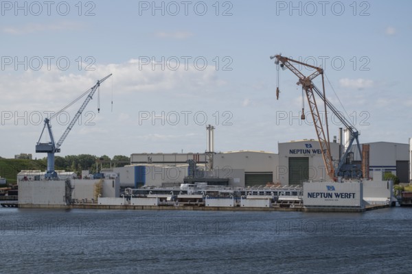 Neptun shipyard with large cranes and industrial buildings, harbour, Warnemünde, Rostock,